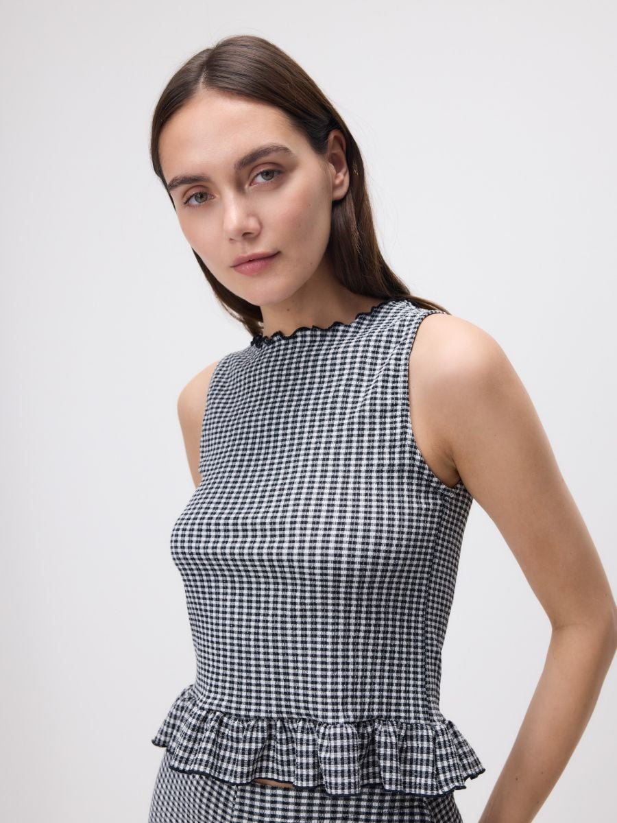 חולצת משבצות main product photo