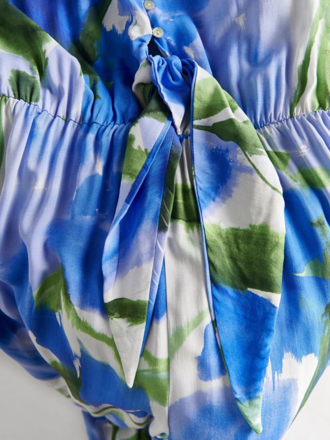 אוברול פרחוני עם פרט קשירה