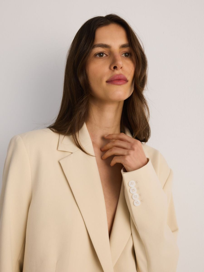 בלייזר אוברסייז סגירה כפתור